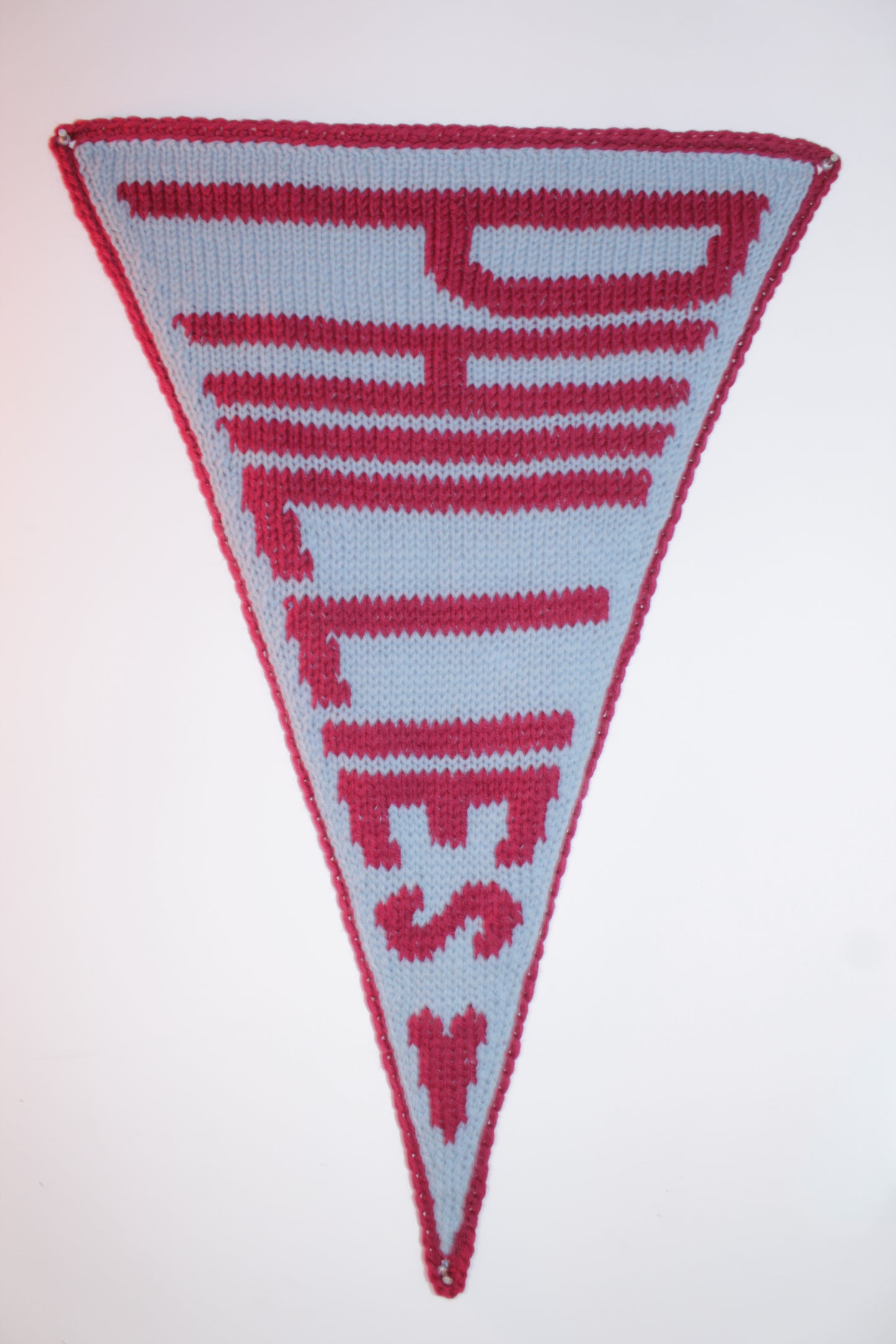 Pennant with 'PHILIES' text on a light blue background