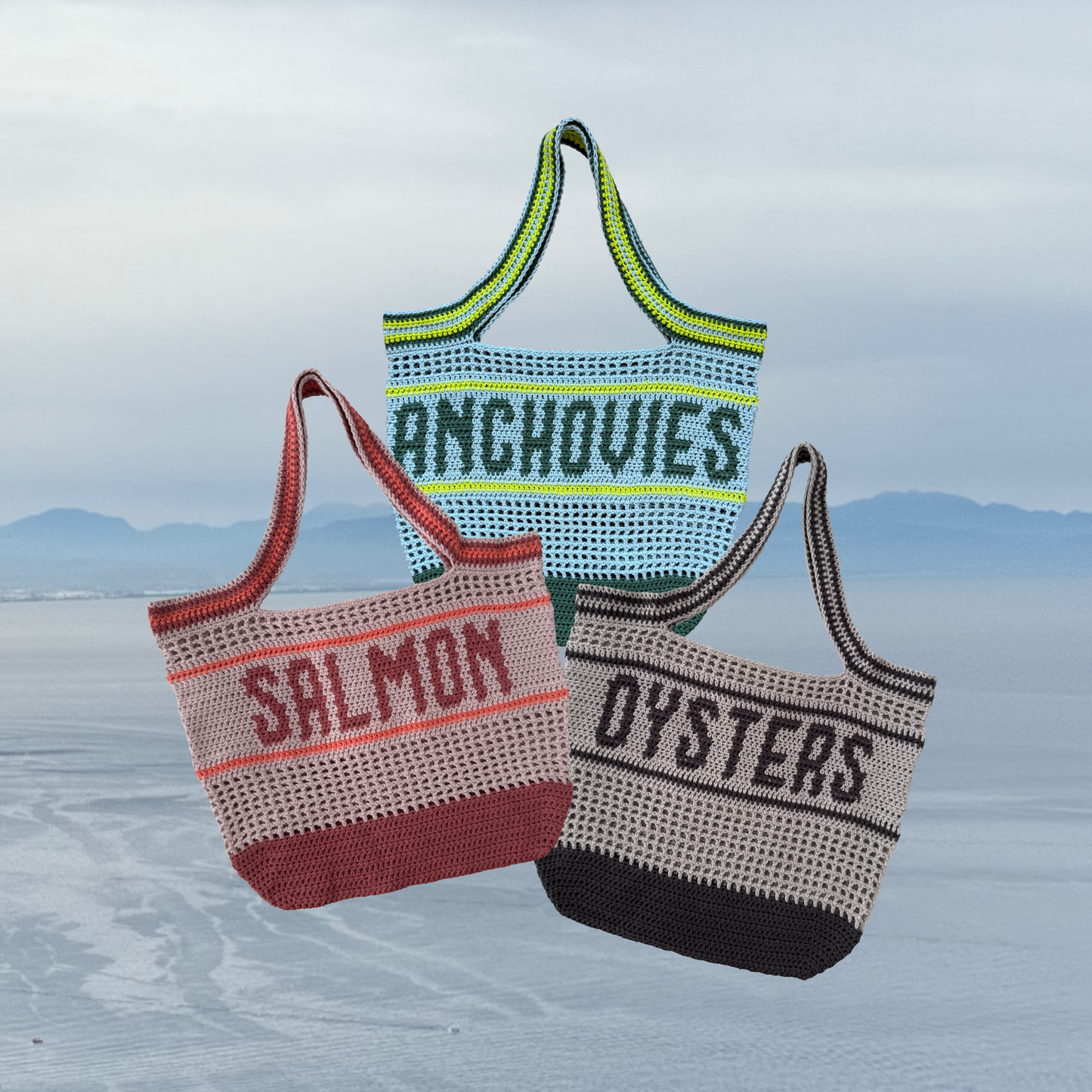 Three crocheted bags with text on an Italian ocean cliffside background